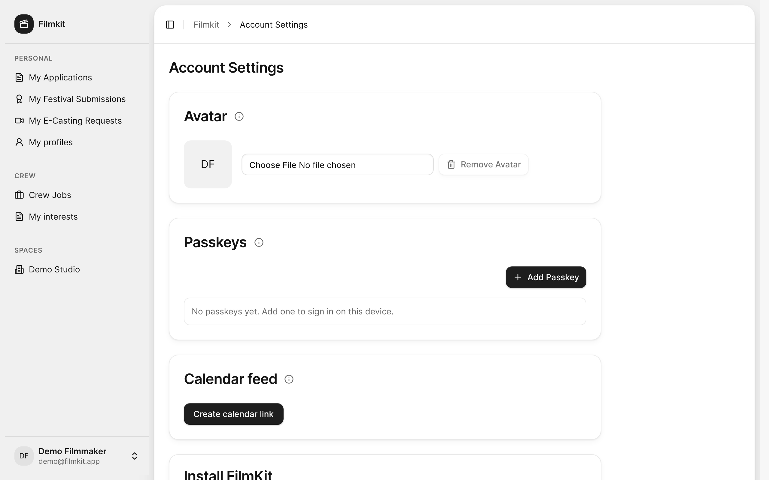 The Account Settings page with the Avatar and Passkeys cards.